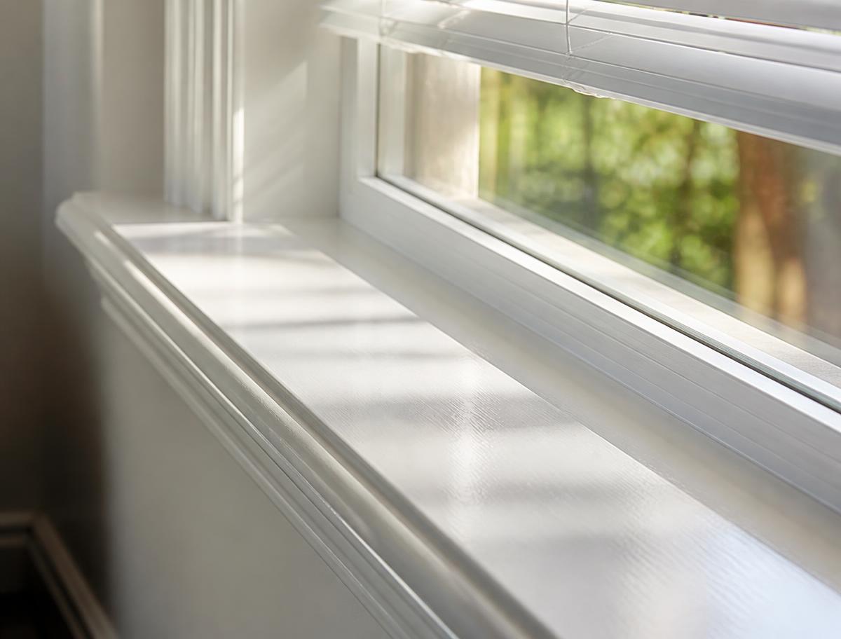 Freshly wiped window sill, trim and glass with no dust left behind